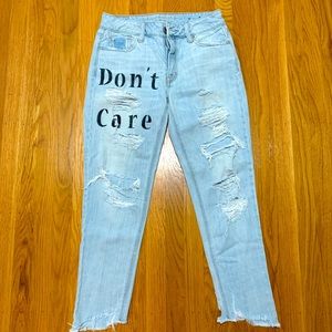 Washed, ripped boyfriend jeans.